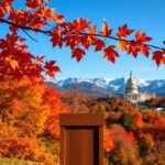 Flick International Scenic view of New Hampshire’s autumn landscape with vibrant fall foliage and an empty wooden podium