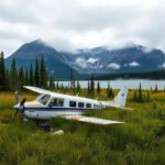 Flick International Wreckage of a Piper PA-12 Super Cruiser airplane in Alaska wilderness