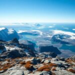 Flick International Aerial view of the untouched Svalbard archipelago with snow-capped mountains and icy fjords