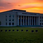 Flick International Empty Department of Veterans Affairs building at sunset representing the need for reform