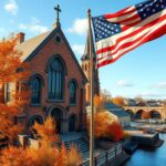 Flick International Vibrant scene of the historic Franco Center in Lewiston, Maine with autumn foliage and an American flag