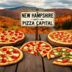Flick International A vibrant display of various pizzas on rustic wooden tables with a backdrop of New Hampshire's autumn landscape