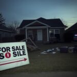 Flick International Dimly lit suburban street in Oklahoma showing a distressed home after an ICE raid