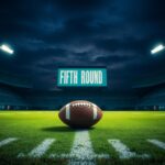 Flick International A lone football resting on the 50-yard line in a darkened stadium under bright lights