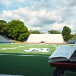 Flick International Empty North Carolina Tar Heels football field with team logo