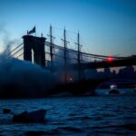Flick International Mexican navy ship Cuauhtémoc colliding with Brooklyn Bridge amid smoke and debris