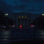 Flick International Exterior view of the CIA headquarters with security gate and police presence