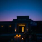 Flick International Somber memorial display with candles and flowers at a Jewish museum entrance