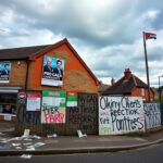 Flick International Cityscape of a small English town hall with election posters for pro-Gaza candidates