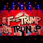 Flick International A vibrant concert stage backdrop featuring anti-Trump graffiti and political imagery.
