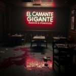 Flick International Interior of a dimly lit restaurant with abandoned tables and overturned chairs after a shooting incident