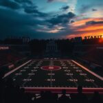 Flick International Dynamic sunset scene of a college football stadium with distinct yard lines and goalposts, devoid of players.