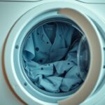 Flick International Close-up view of a domestic washing machine with healthcare uniforms inside, symbolizing bacteria contamination
