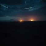 Flick International Dramatic nighttime scene of a barren Middle Eastern landscape with military structures hinting at tension