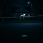 Flick International dimly lit aftermath of a tragic shooting scene in Brooklyn Park, Minnesota