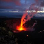 Flick International Dramatic view of Kīlauea volcano at dusk with lava fountains