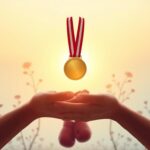 Flick International Abstract representation of love and support between parents and child with a gold medal