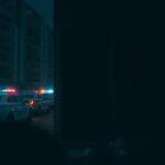 Flick International Dimly lit urban scene at night with police cars and a shadowy closet