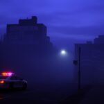 Flick International Foggy Boston street at dusk with a police car and ICE sign
