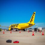 Flick International Spirit Airlines aircraft evacuated at Detroit Metro Airport due to bomb threat
