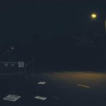 Flick International A dark street scene with empty police barricades and ominous trees at night